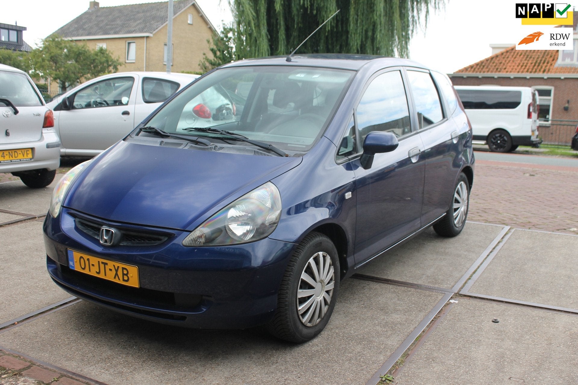 Honda Jazz 1.4 LS 5drs nwe apk, Auto's, Voorwielaandrijving, 4 cilinders, Blauw, Origineel Nederlands
