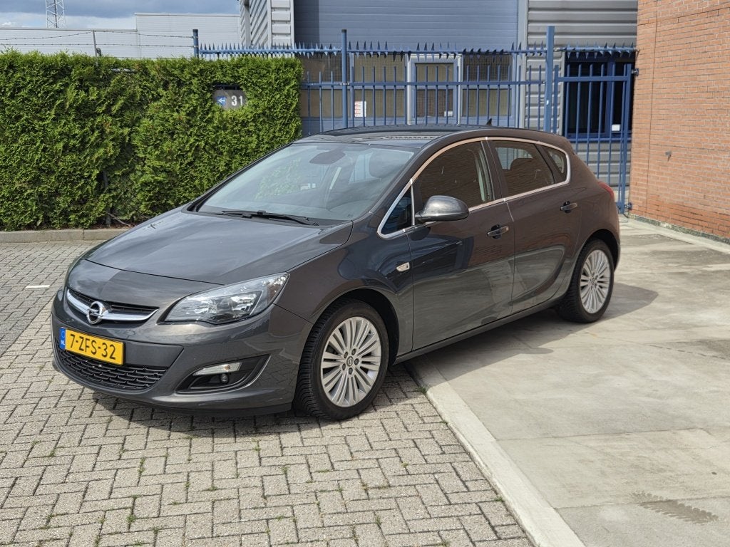 Opel Astra 1.4 Turbo Blitz (bj 2015), Auto's, Opel, Keurmerk '100% Onderhouden', Euro 5, Stof, Gebruikt
