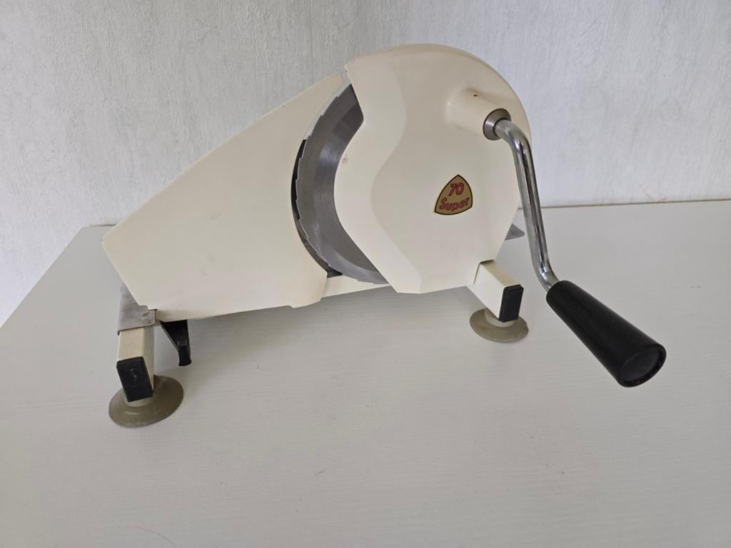Vintage snijmachine, Ophalen