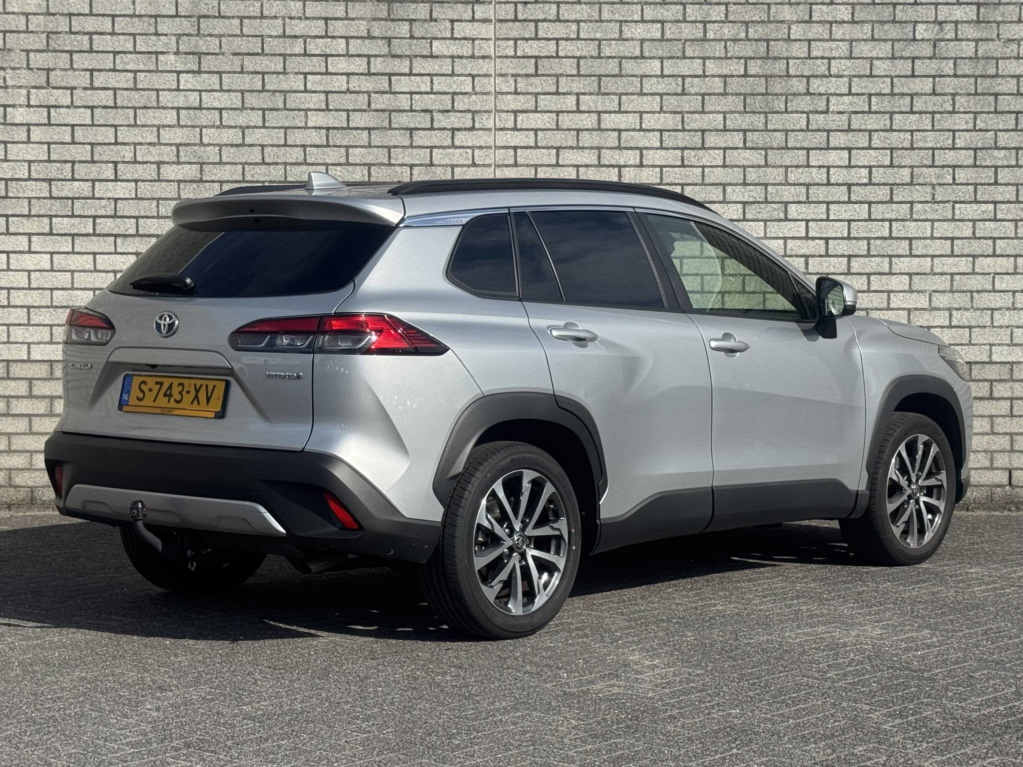 Toyota Corolla Cross 2.0 High Power Hybrid First Edition | T, Auto's, Gebruikt, 4 cilinders, Met garantie (alle), Leder en Stof