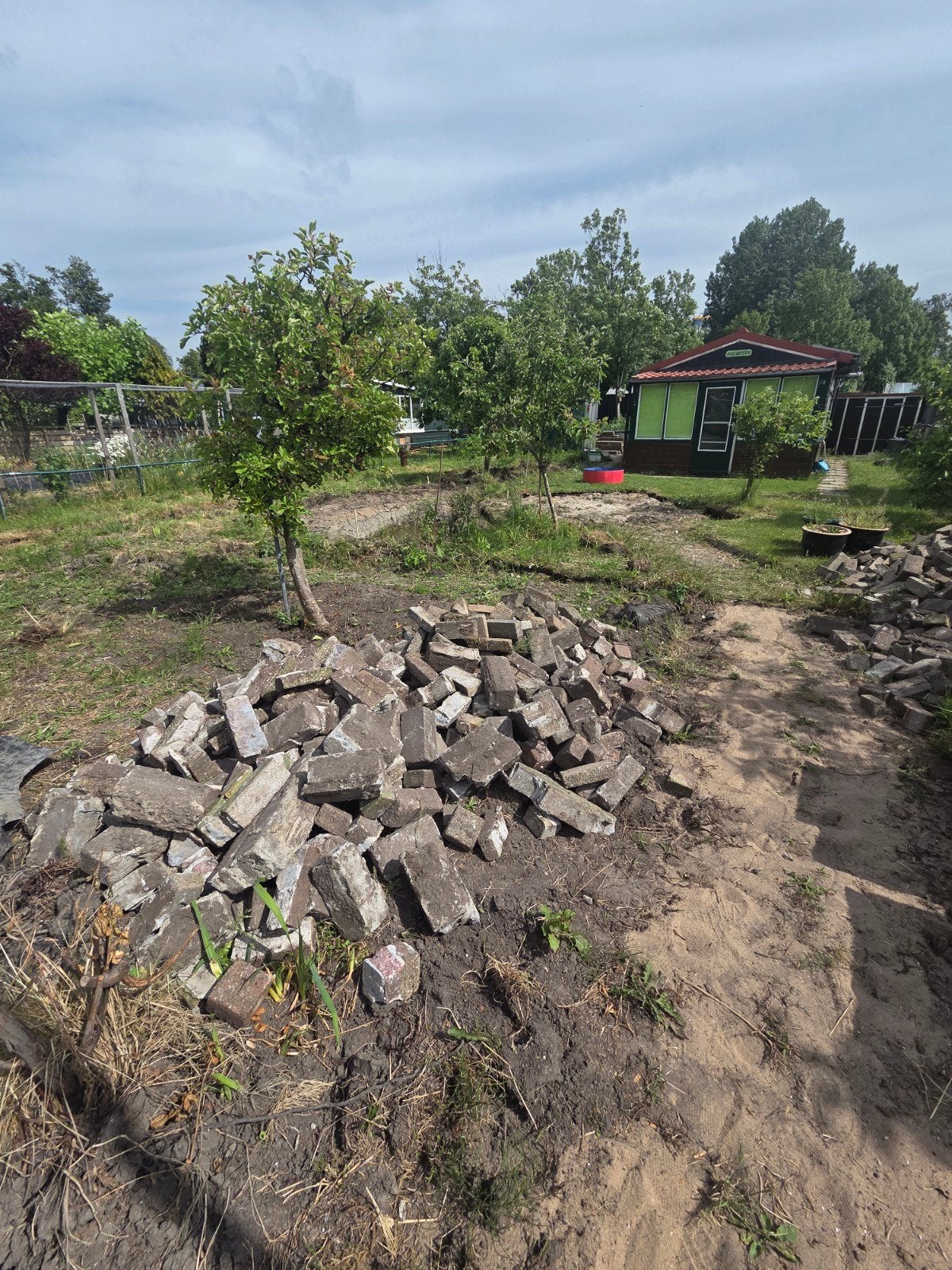 Gebruikte bakstenen en betonblokken, Ophalen