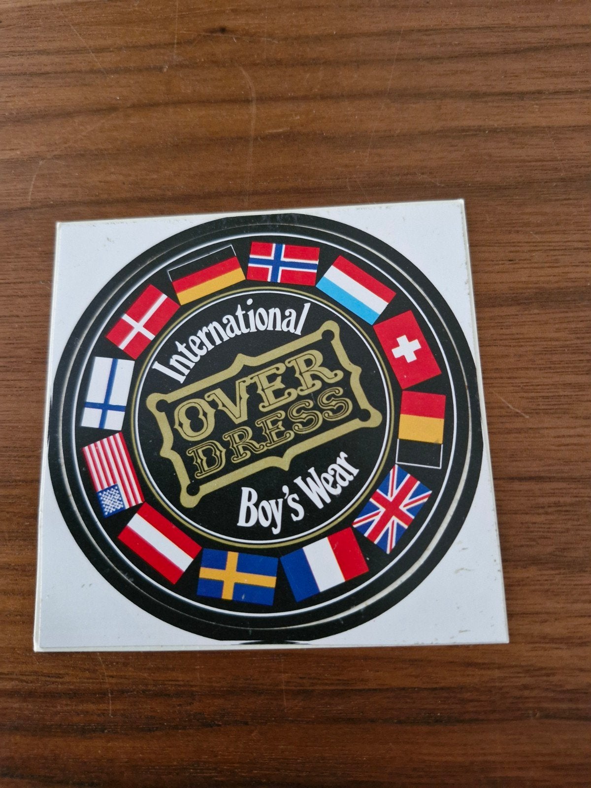 12184 Vintage International Over Dress Boy's Wear Sticker, Ophalen of Verzenden, Zo goed als nieuw