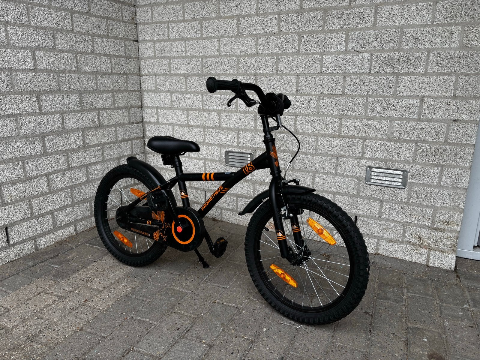 Prometheus Kinderfiets 18 inch met zijwieltjes, Ophalen of Verzenden, Gebruikt, 16 tot 20 inch, Zijwieltjes