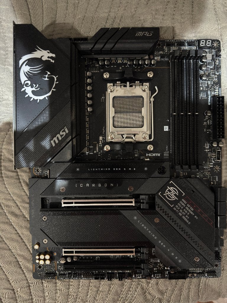 MSI MPG X670E Carbon WiFi (AMD AM5), Computers en Software, Moederborden, Ophalen, Zo goed als nieuw, ATX, DDR5