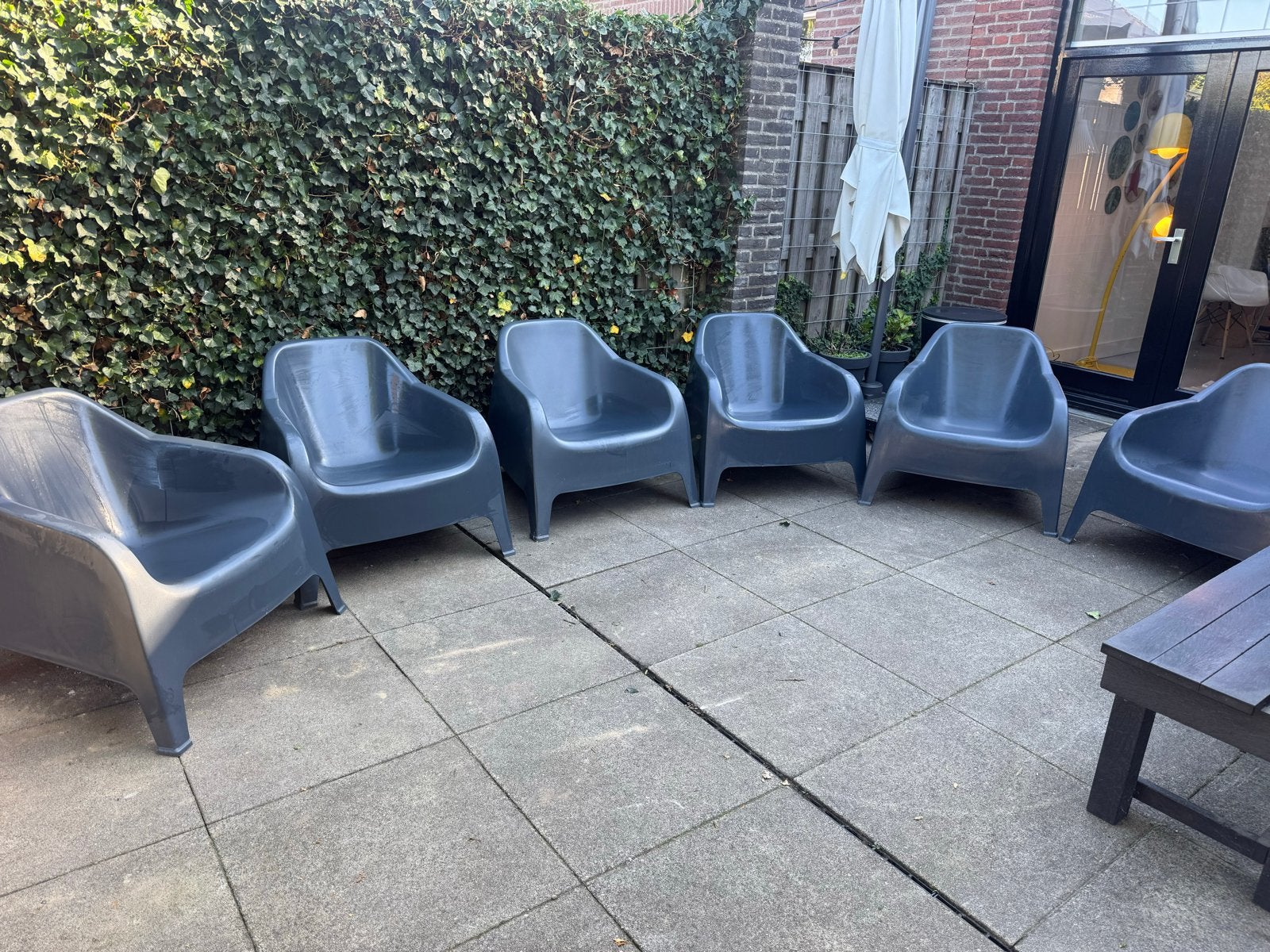 6 stapelbare antraciet kunststof loungestoelen