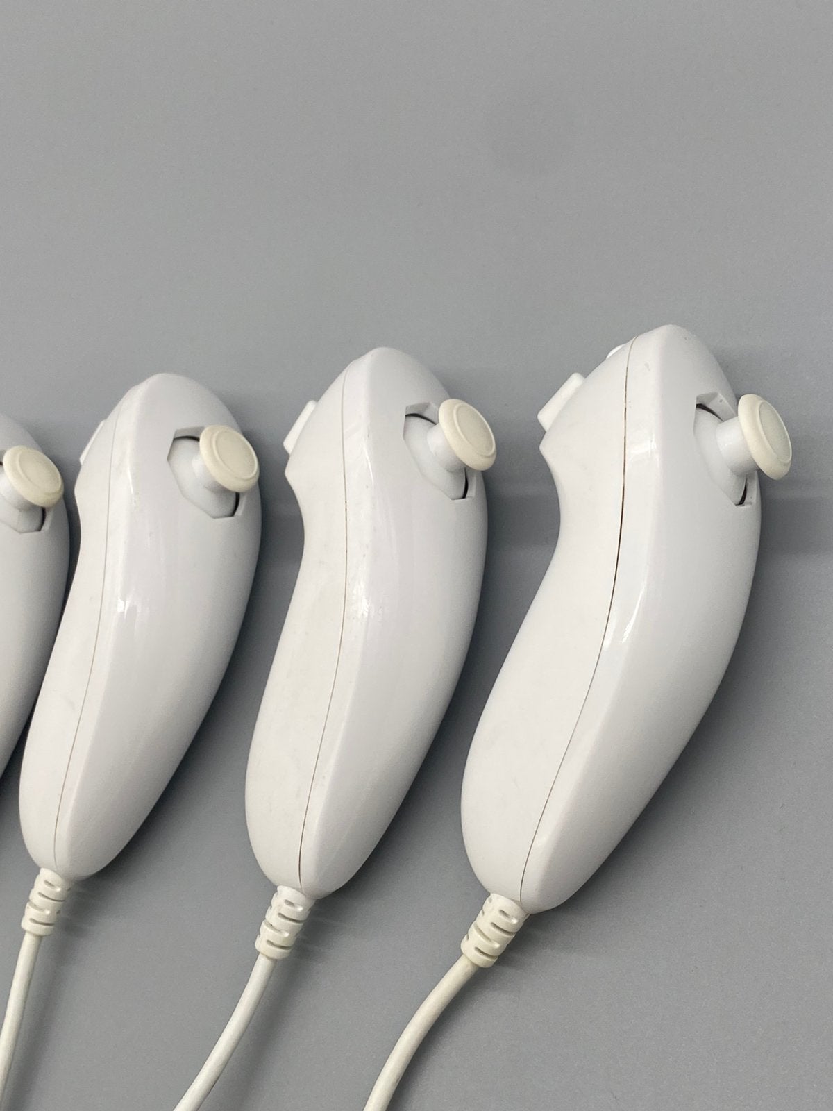 Originele Nintendo Wii Nunchuks Bundel (4x), Nintendo, Www.nintendo.com, Overige genres, Ophalen of Verzenden