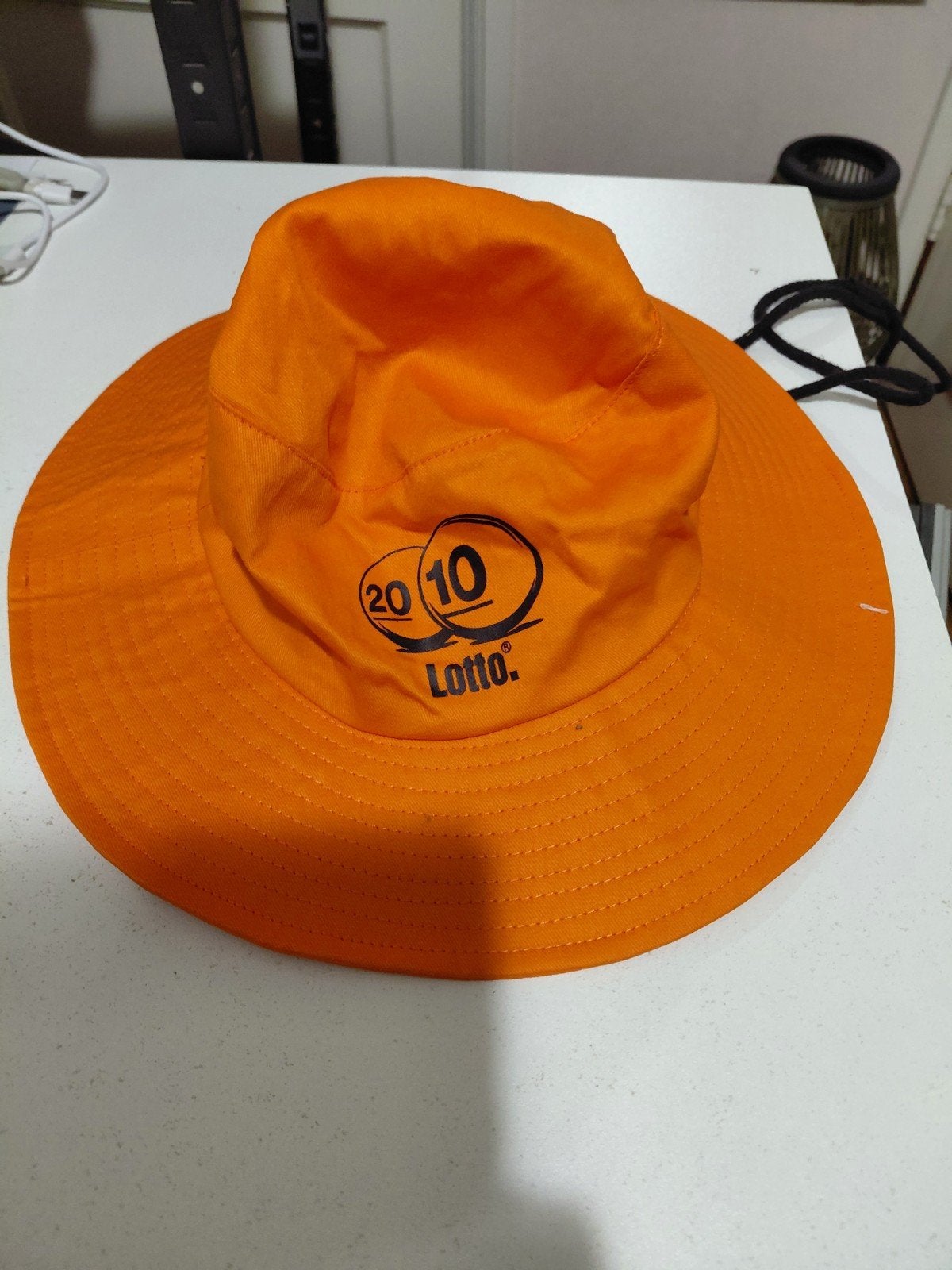 Lotto 2010 Oranje Bucket Hat / Vissershoed – One Size, Ophalen of Verzenden, Nieuw, One size fits all, Hoed