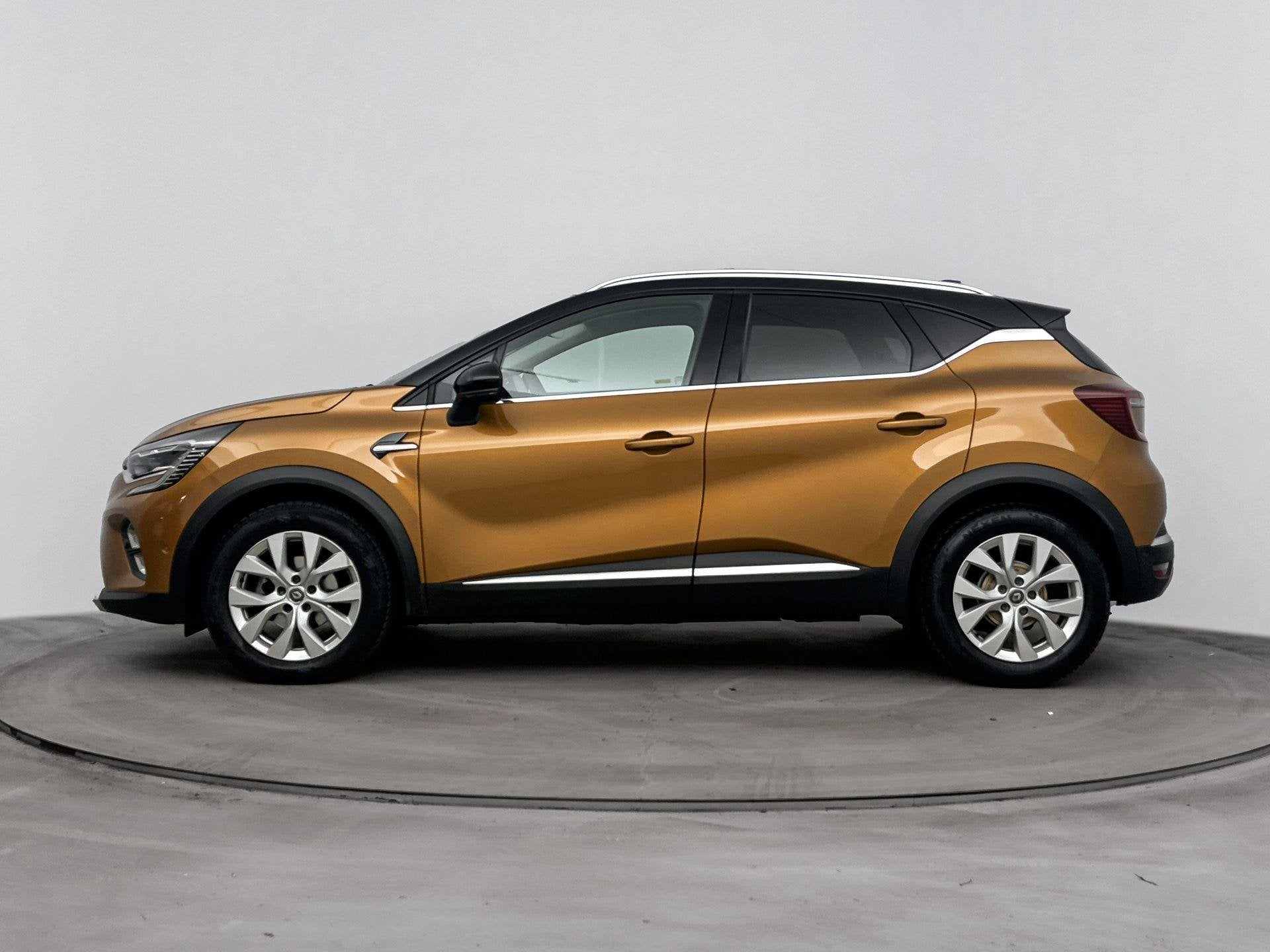 Renault Captur 1.3 TCe Intens 130PK | Trekhaak | Navigatie 9, Auto's, Voorwielaandrijving, Stof, Gebruikt, Euro 6