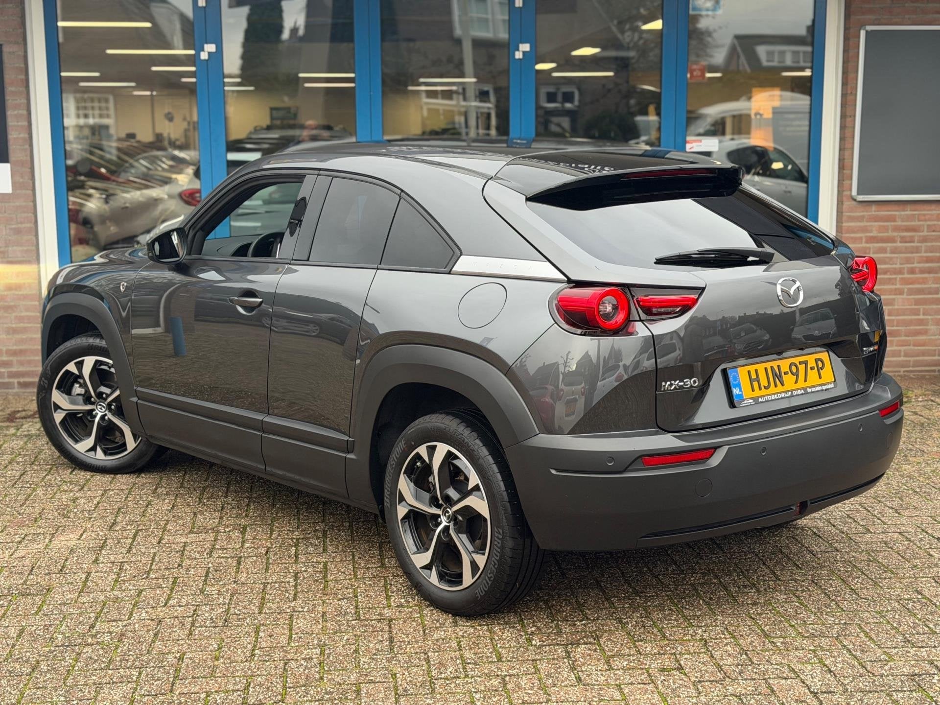 Mazda MX-30 E-SkyActiv R-EV 170 Advantage 2025 AUT NAVI NAP, Auto's, Mazda, Dealer onderhouden, Gebruikt, Bedrijf, 1753 kg