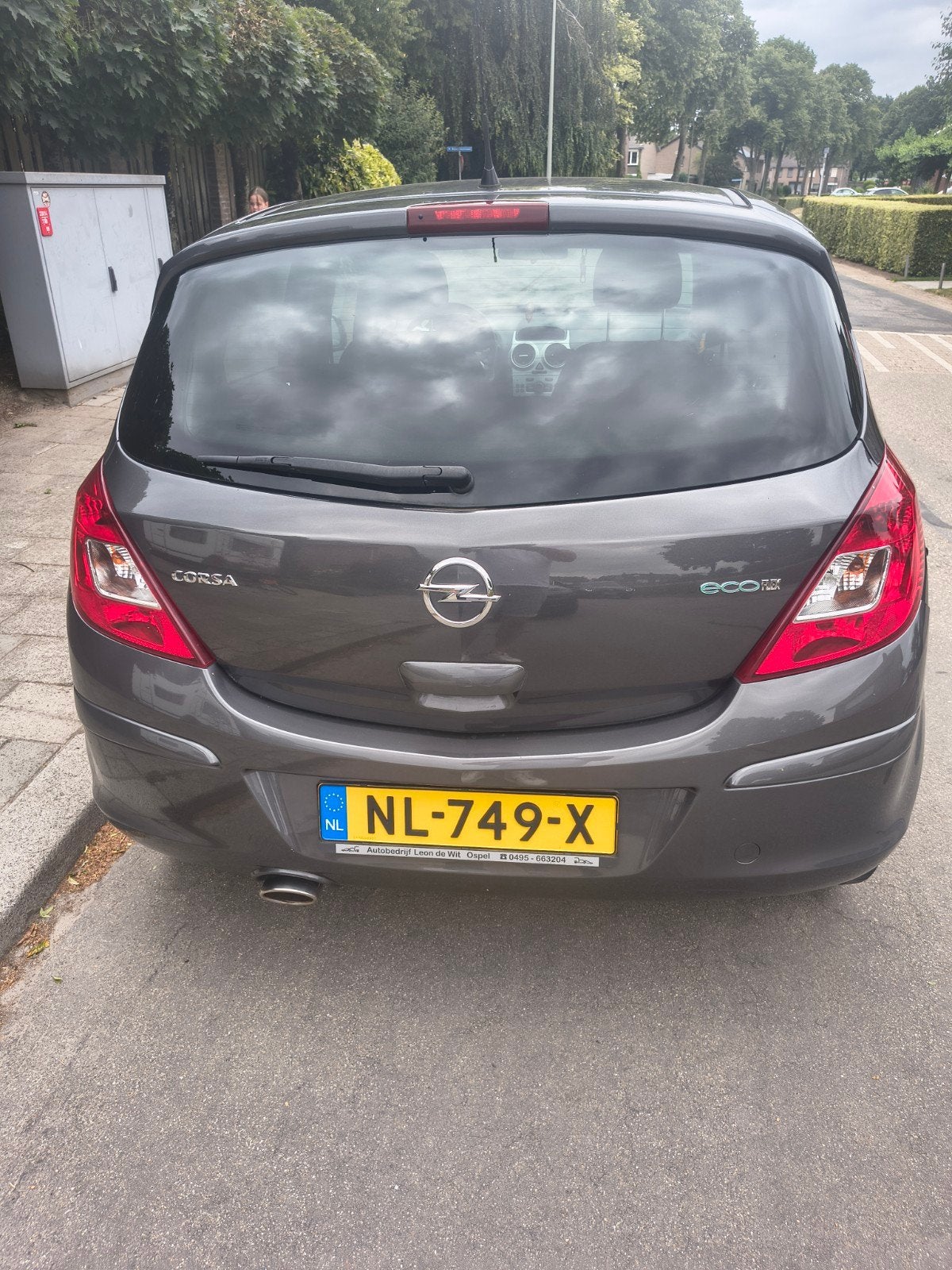 Opel Corsa 1.2 Ecoflex benzine, 5 Deur, 2011 Grijs met airco, Voorwielaandrijving, Stof, 4 cilinders, 1229 cc