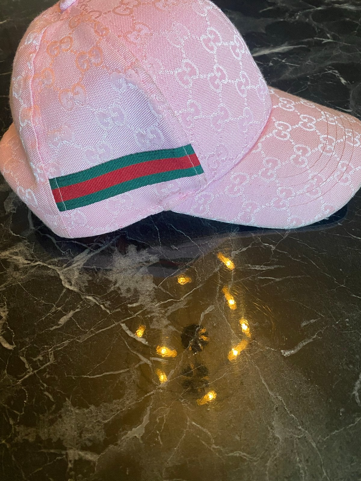 Roze Gucci pet (nep), Ophalen, Pet
