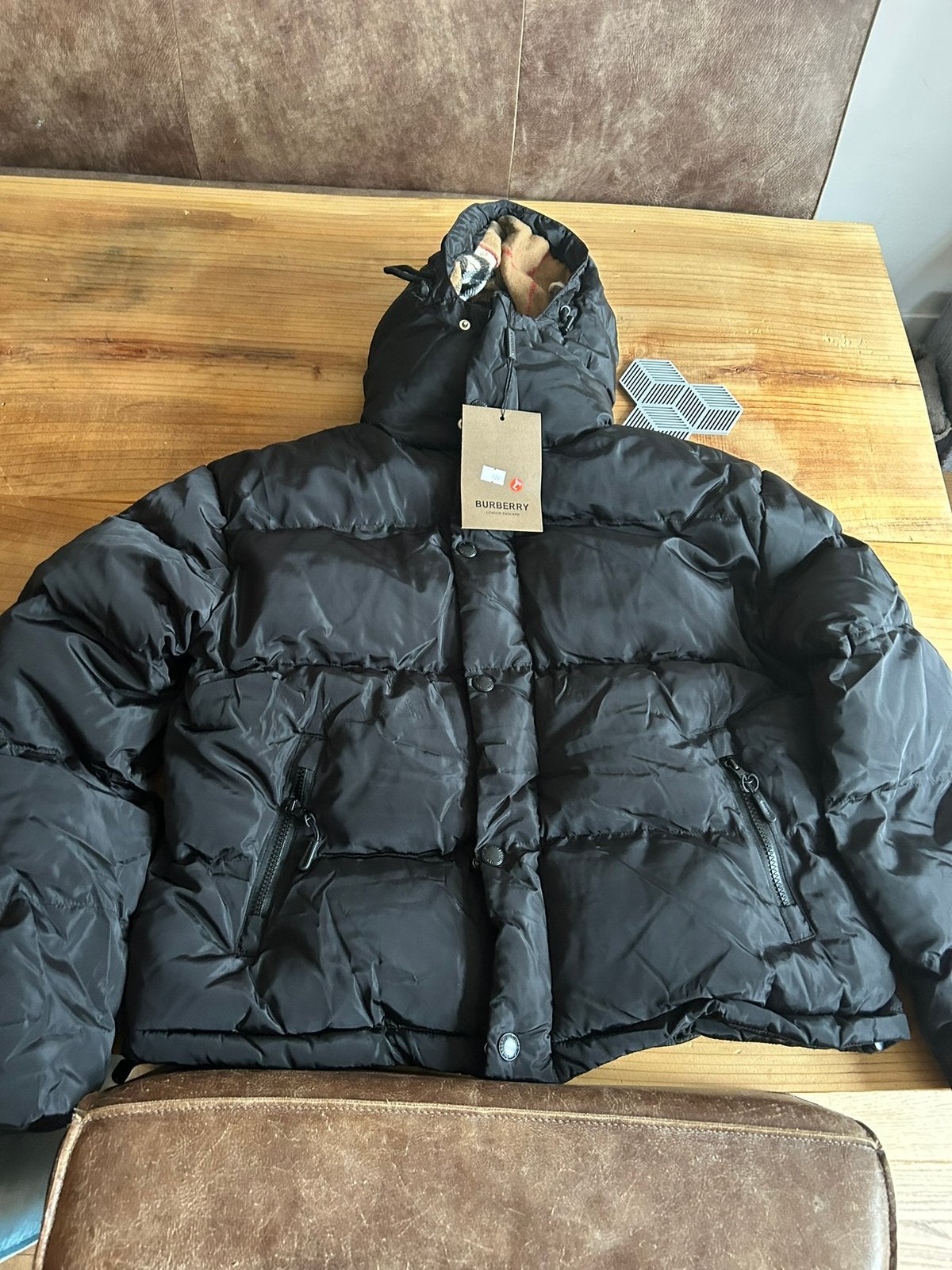 Burberry jas L, Ophalen of Verzenden, Zo goed als nieuw, Maat 52/54 (L), Zwart