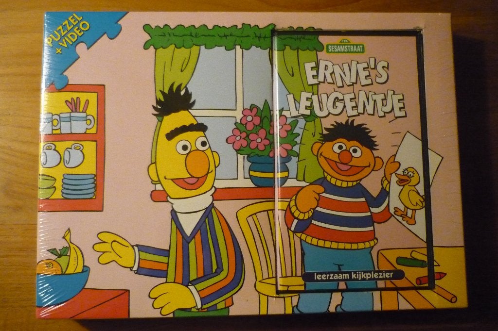 NIEUW Sesamstraat ''ERNIE'S LEUGENTJE '' puzzel + Video, Ophalen, 10 tot 50 stukjes, Nieuw, 4 tot 6 jaar