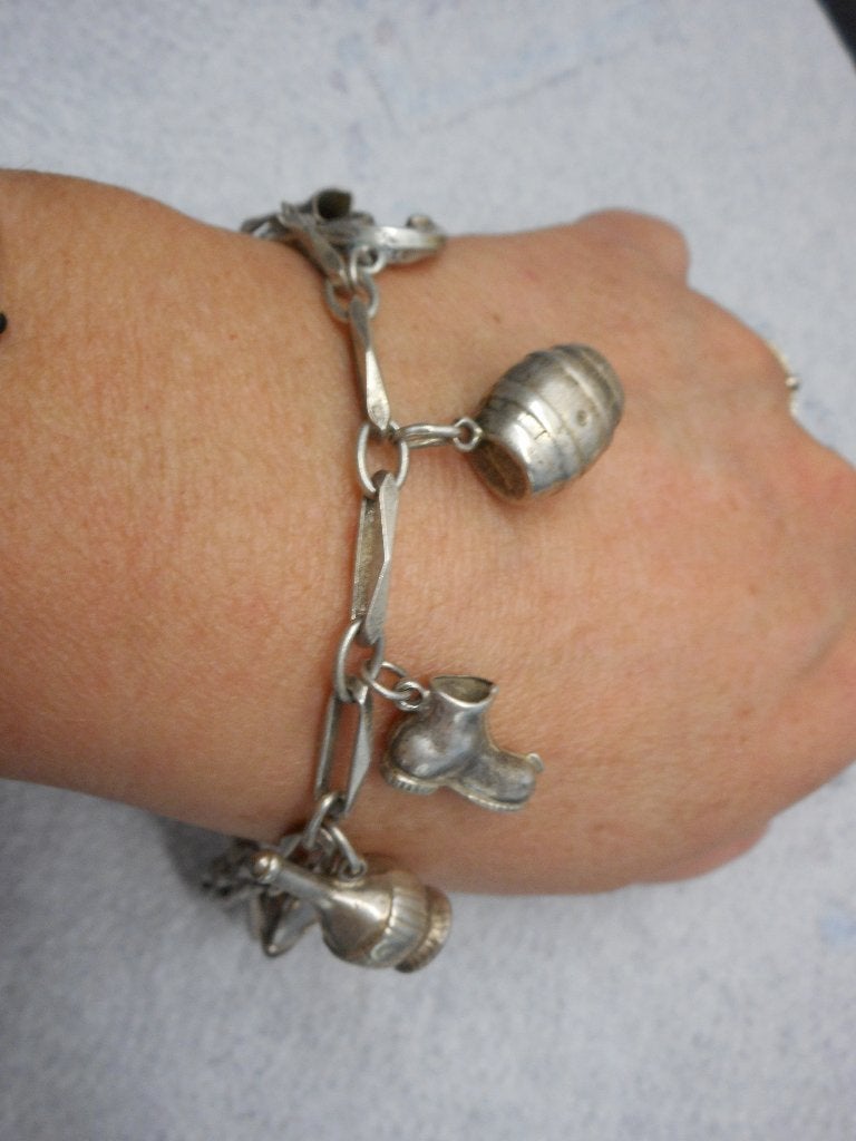 zilveren closed forever armband met 9 bedels nr.554, Verzenden, Zo goed als nieuw, Met bedels of kralen, Zilver