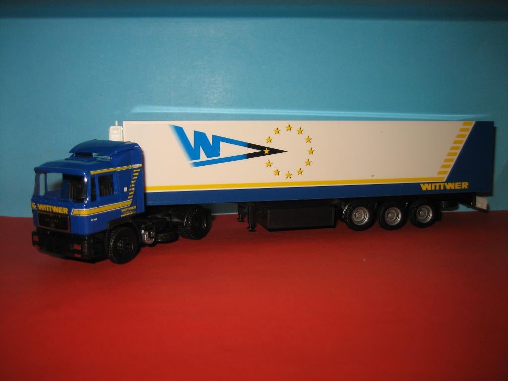 Wittwer  MAN  met oplegger  Herpa, Hobby en Vrije tijd, Modelauto's | 1:87, Ophalen of Verzenden, Zo goed als nieuw, Bus of Vrachtwagen