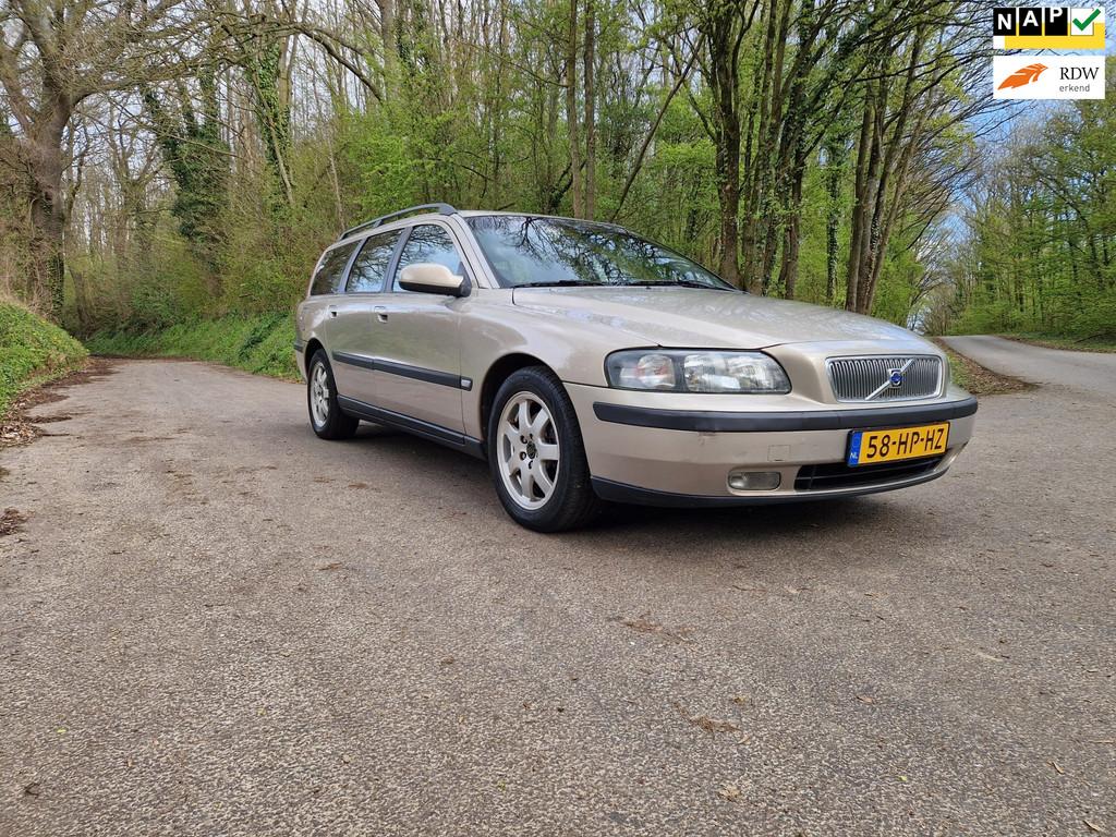 Volvo V70 2.4 Automaat Nwe Distributie&APK., Auto's, Zwart, Leder en Stof, Beige, 1558 kg