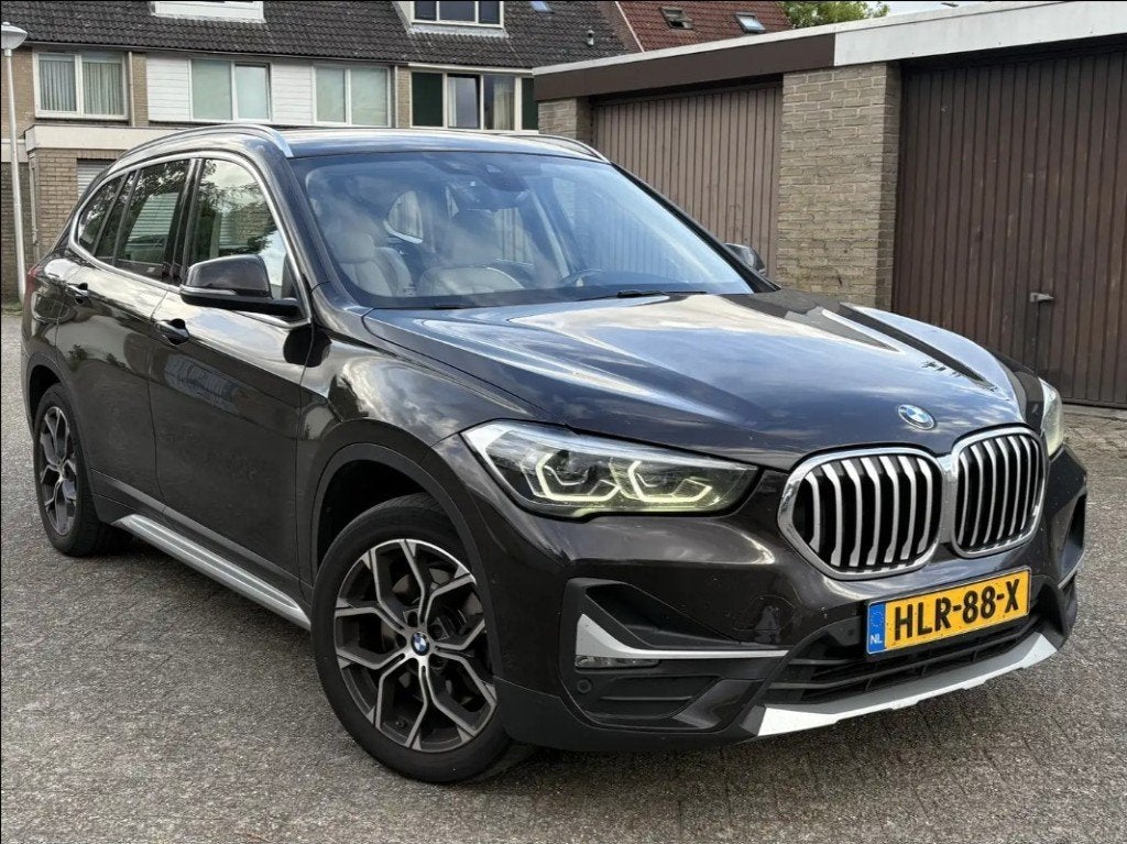 BMW X1 xDrive25e Plug-in Hybrid Leder Camera Stoelverwarming, Auto's, Bruin, 3 cilinders, SUV of Terreinwagen, 220 pk