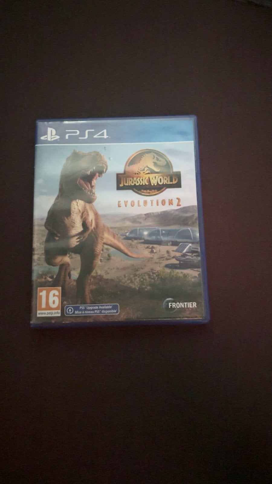 Jurassic World Evolution 2 PS4 - Bouw je eigen dinopark!, 1 speler, Ophalen of Verzenden, Zo goed als nieuw, Vanaf 16 jaar