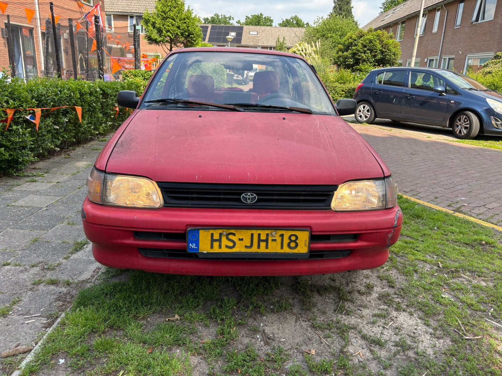 Toyota Starlet 1.3 XLI 12V E2 1994 Rood, Auto's, Toyota, 4 cilinders, Leder en Stof, Origineel Nederlands, Overige kleuren