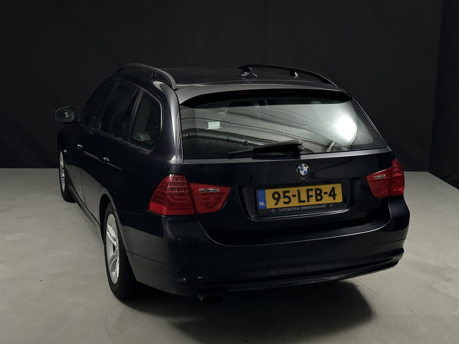 BMW 3 Serie Touring 318i Business Line *Navi*AC* (bj 2010), Euro 5, Achterwielaandrijving, Blauw, Origineel Nederlands