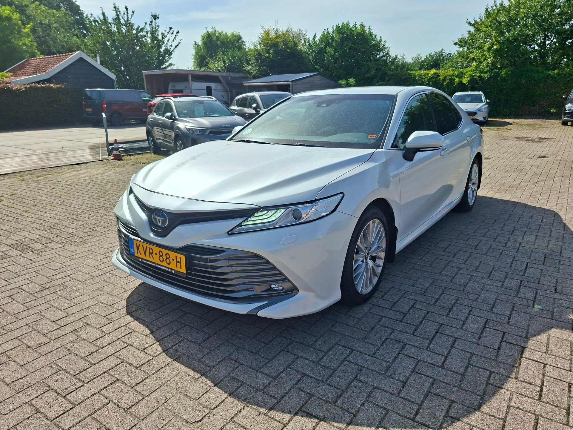Toyota Camry 2.5 Hybrid Executive adaptieve cruise, Auto's, Gebruikt, Euro 6, 4 cilinders, Leder