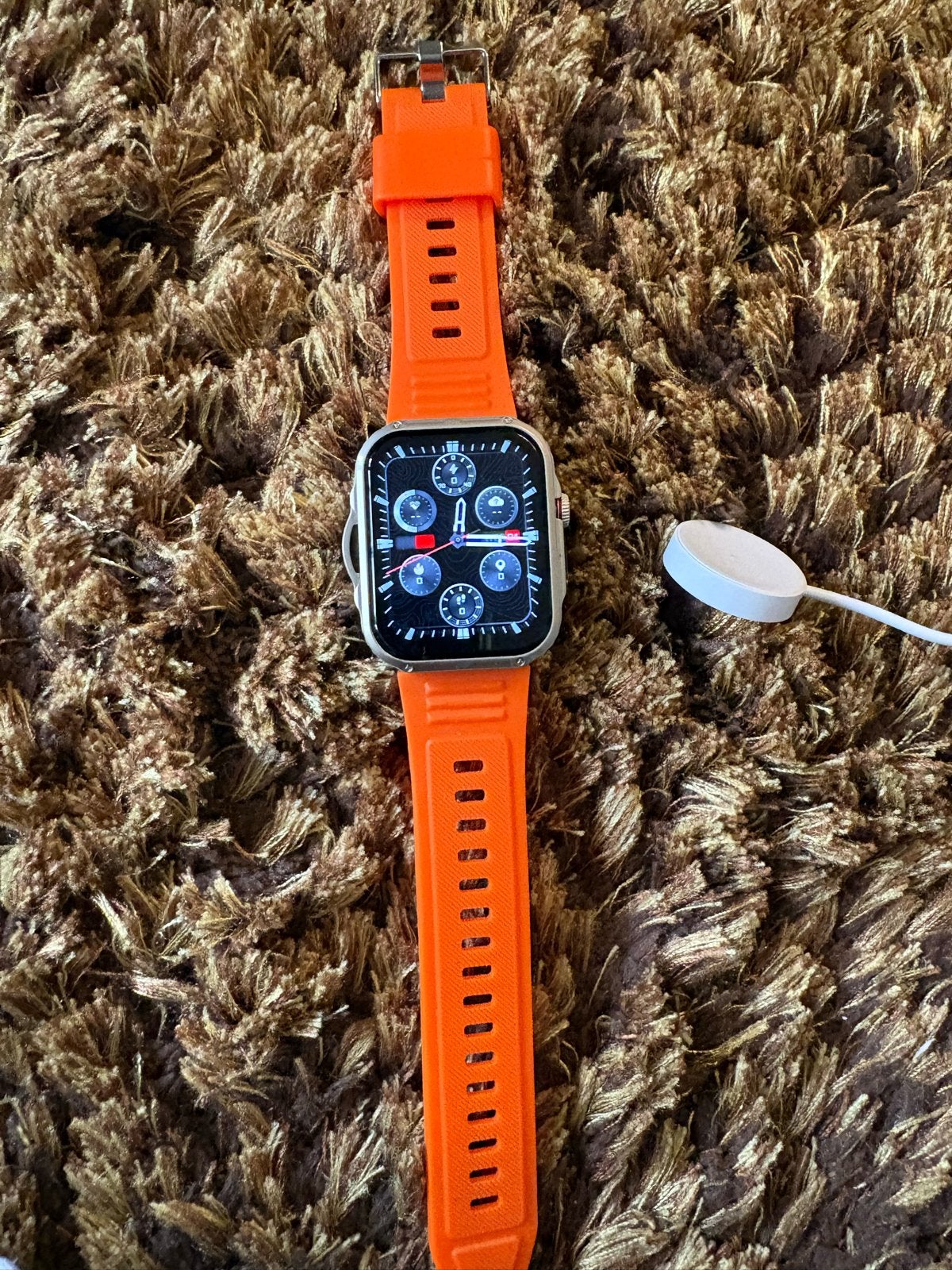 Smartwatch met oranje bandje en oplader, Hartslag, IOS, Oranje, Ophalen of Verzenden