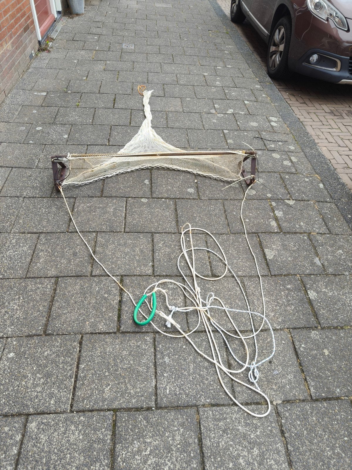 Vis net om langs de waterkant te lopen, Ophalen, Net of Fuik