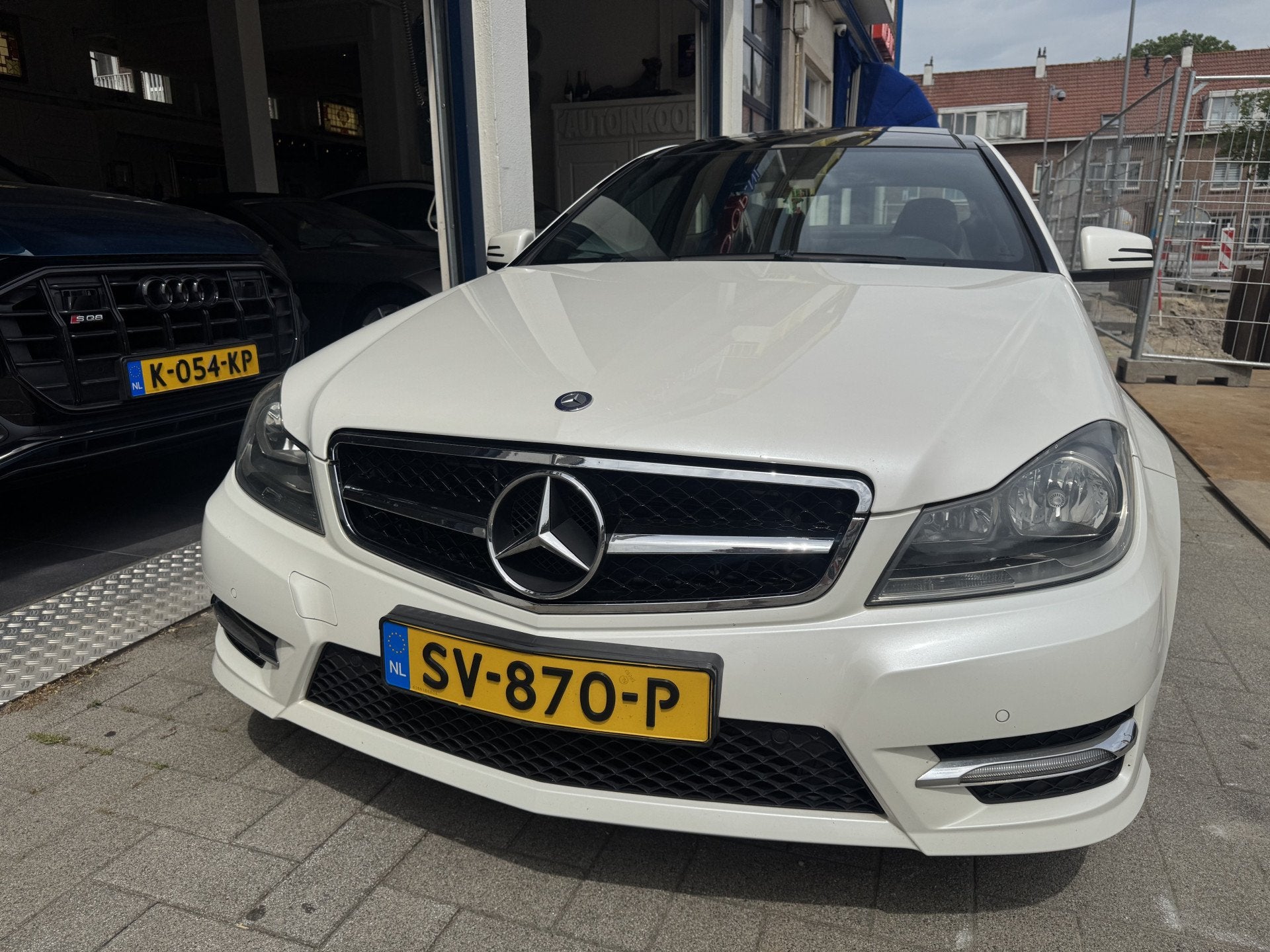 Mercedes-Benz C-Klasse Coupé 180 Ambition AMG/PANORAMA/LEDE, Euro 5, Achterwielaandrijving, Zwart, 4 stoelen