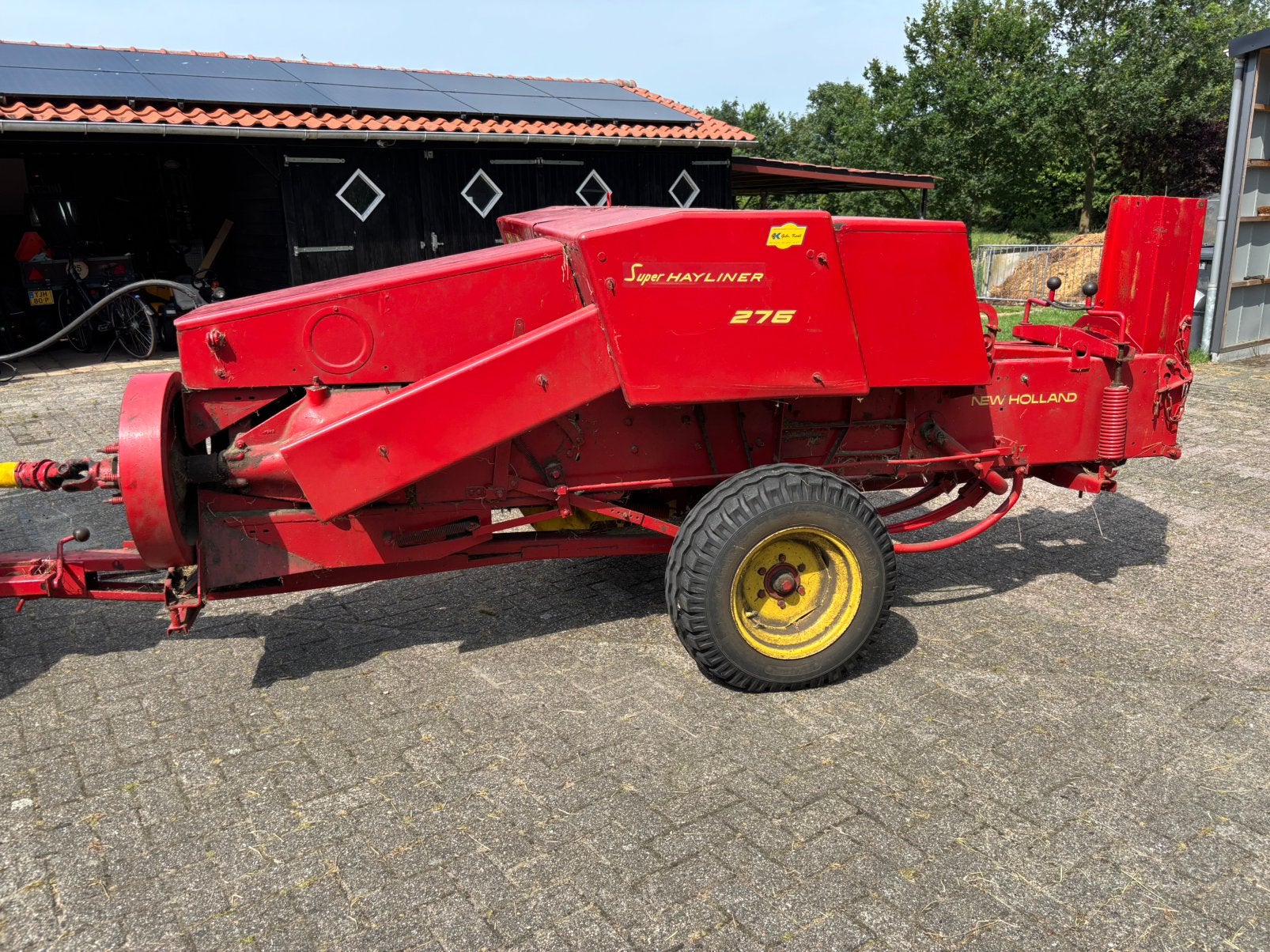 Balen pers New holland 276, Ophalen