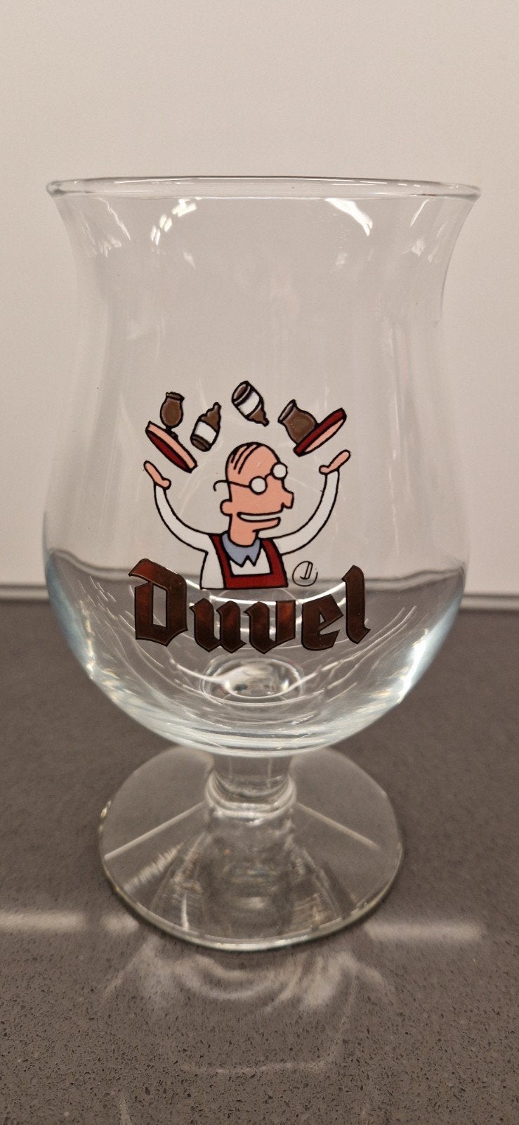 Duvel bierglas met jonglerende ober  - limited edition, Ophalen of Verzenden, Zo goed als nieuw, Glas of Glazen, Duvel