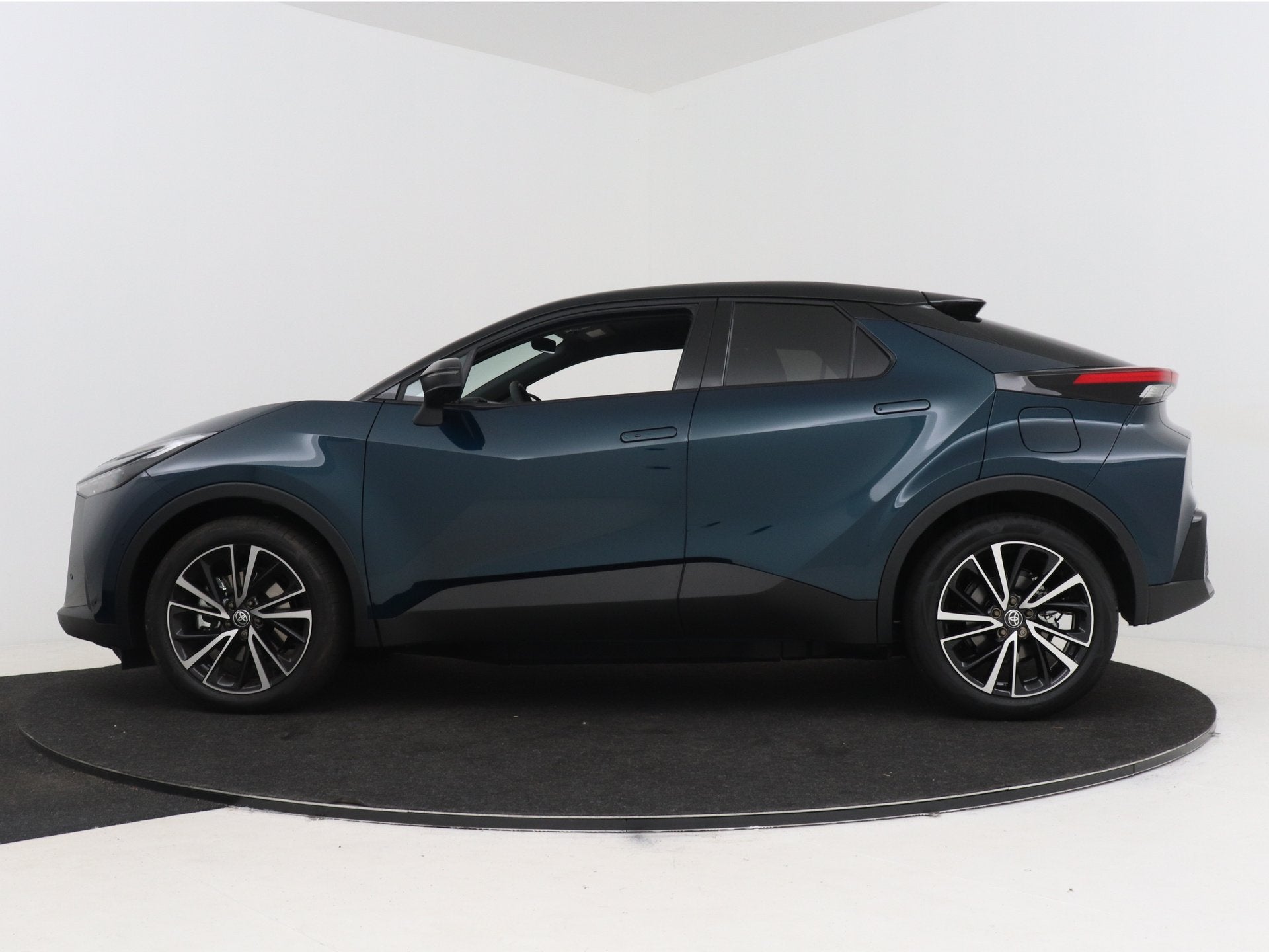 Toyota C-HR 2.0 Plug-in Hybrid 220 Executive | NL dealeronde, Auto's, 12 maanden, 4 cilinders, Blauw, Leder en Stof