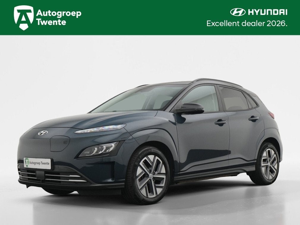 Hyundai KONA EV Premium 64 kWh | Wit leder | Navigatie | Cam, Auto's, 12 maanden, 0 cilinders, Gebruikt, Blauw