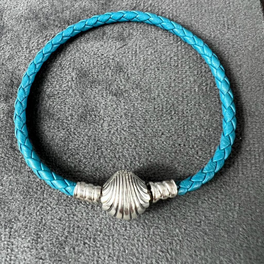 Pandora armband | gevlochten blauw met schelp | 17cm| 406622, Pandora, Ophalen of Verzenden, Zo goed als nieuw, 1 bedel