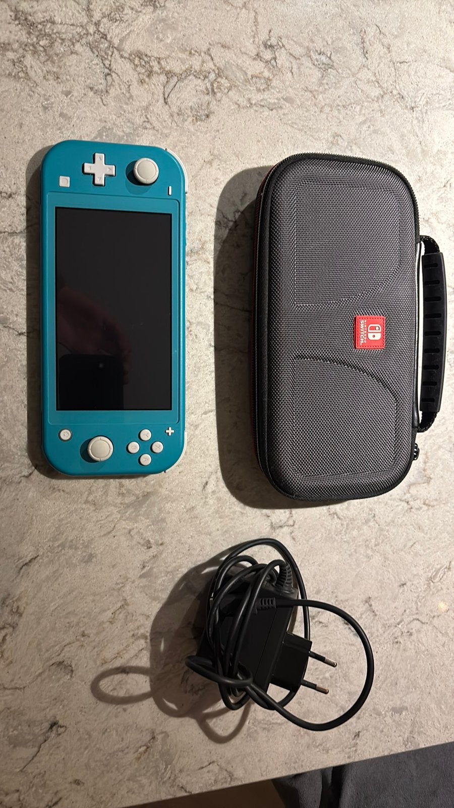 Nintendo Switch Lite in zeer goede conditie, Ophalen, Turquoise, Zo goed als nieuw, Met beschermhoes of tas