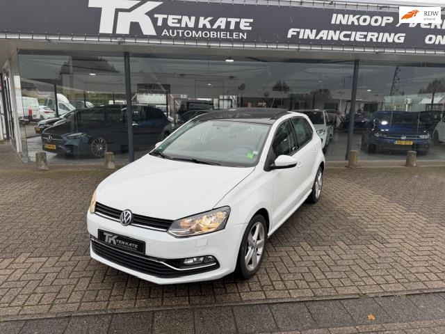 Volkswagen Polo 1.2 TSI Highline Pano/Navi/Stoelver/PDC/LMV, Auto's, Stof, Gebruikt, Zwart, Wit