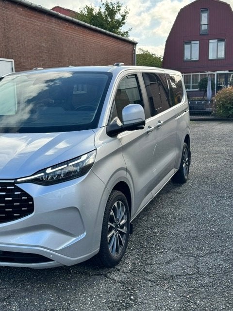 Ford Tourneo Custom Titanium X -8 persoons - 2025 - 15000 km, Auto's, Dealer onderhouden, 1850 kg, Leder en Stof, Plug-in hybride