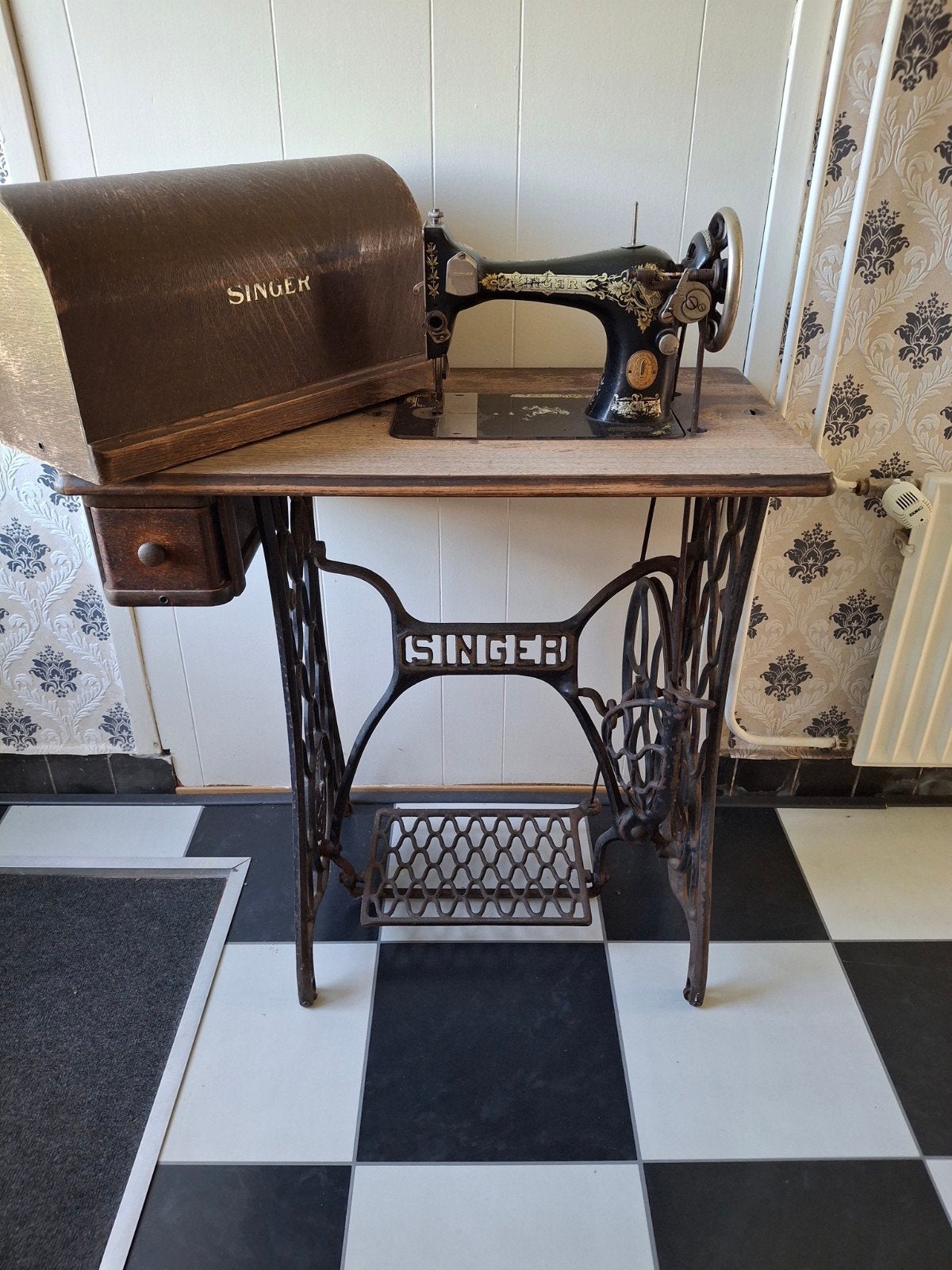 oude singer naaimachine, Ophalen