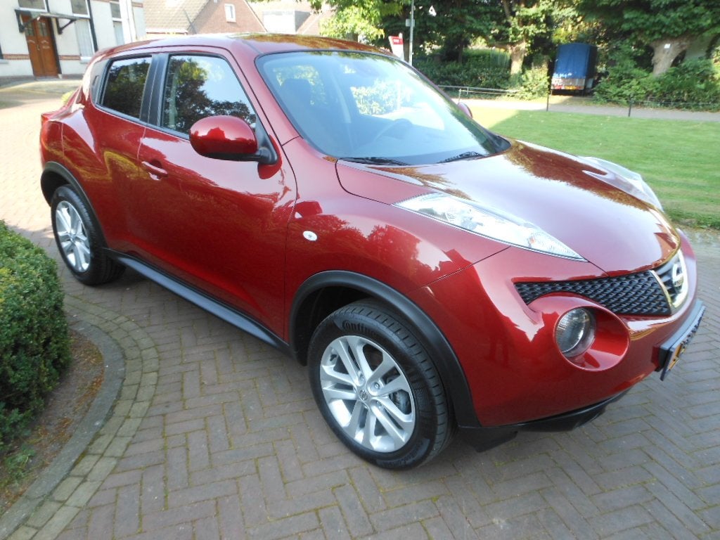 NISSAN Juke 1.6 117pk Tekna bij Vakgarage met 12 maanden B, Auto's, Nissan, Voorwielaandrijving, 12 maanden, Stof, Zwart