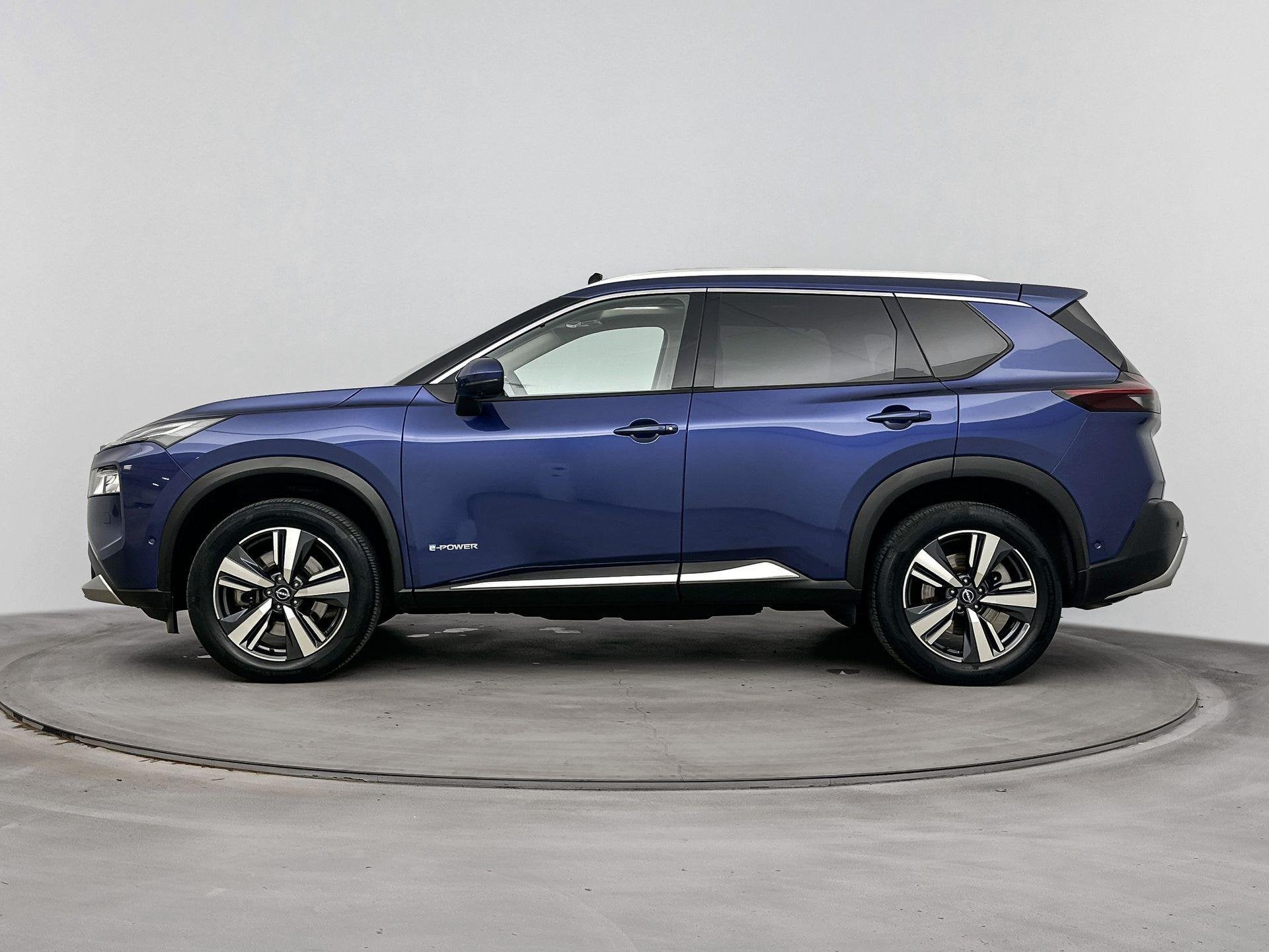 Nissan X-Trail 1.5 e-4orce Tekna 4WD 7p. | Zonnedak | Cold P, Auto's, Nissan, Automaat, 1497 cc, Gebruikt, Blauw