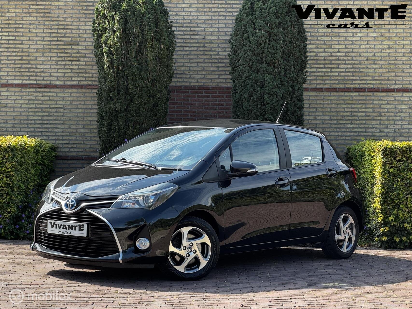 Toyota Yaris 1.5 Hybrid Trend Bi-Tone Camera*Cruise*Navi*Cli, Auto's, Gebruikt, Euro 6, Met garantie (alle), Origineel Nederlands