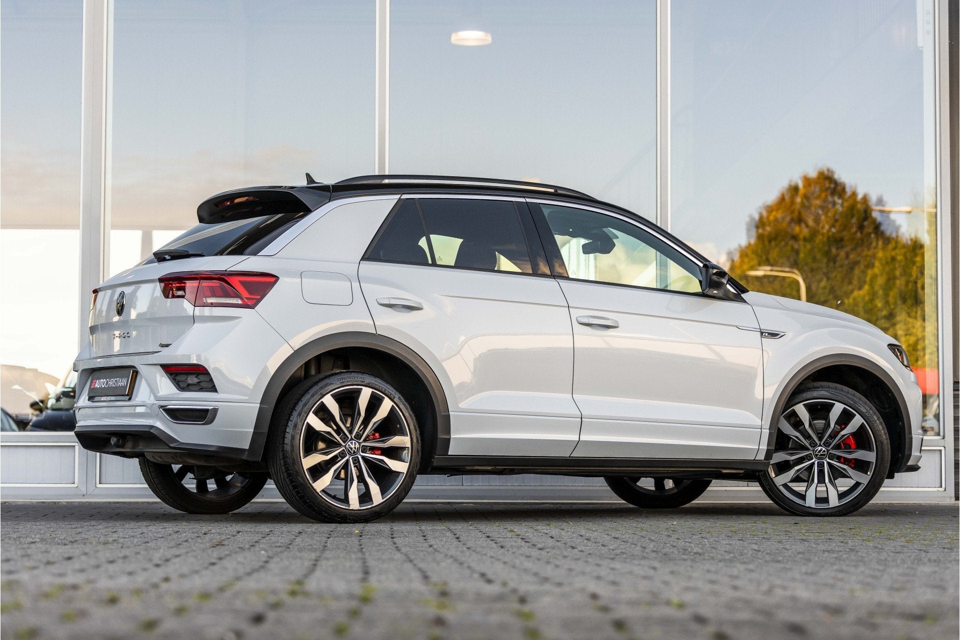 Volkswagen T-Roc 2.0 TSI 4Motion Sport Business R | Camera |, Auto's, 12 maanden, Gebruikt, Euro 6, Wit