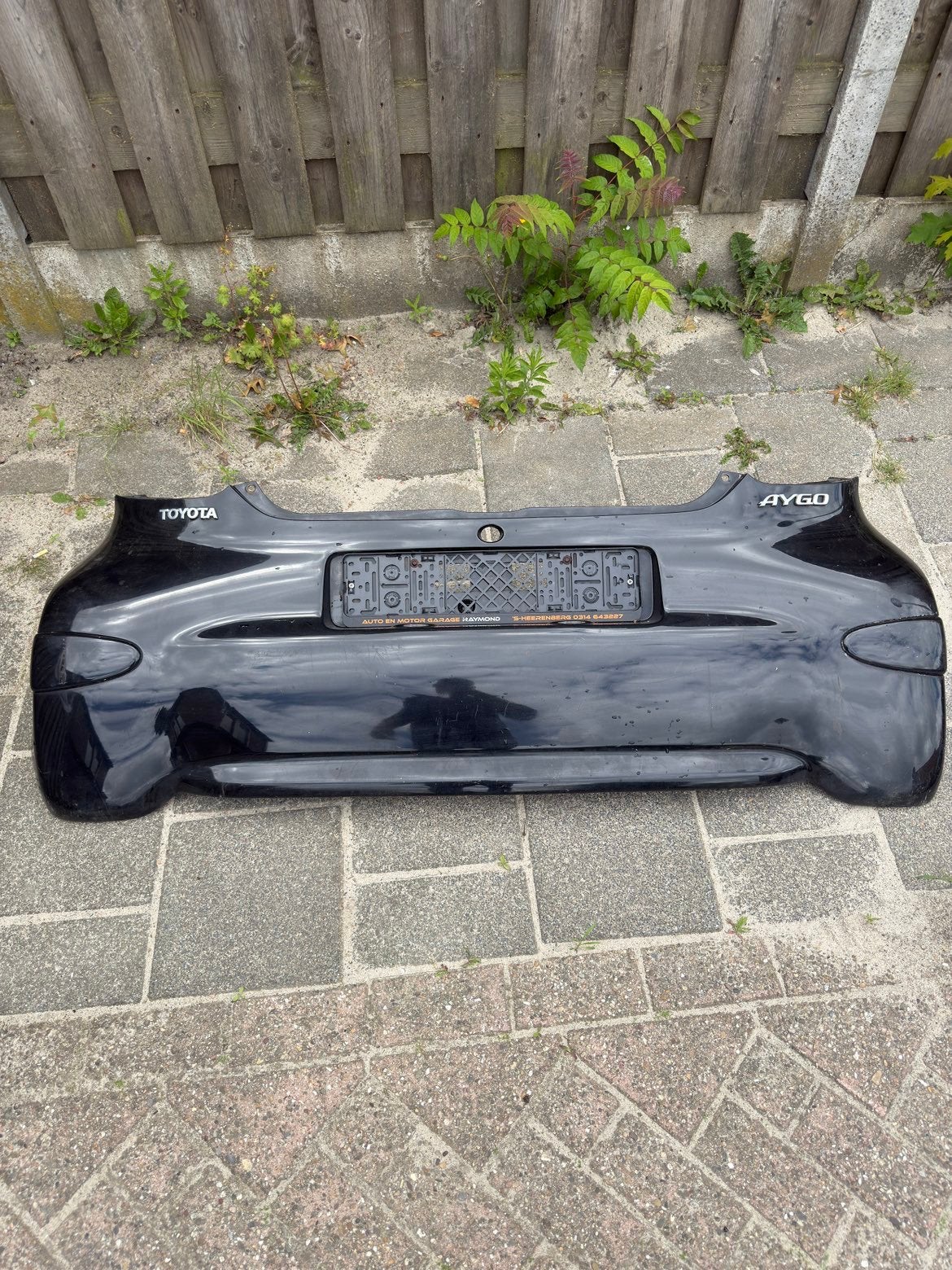 Toyota Aygo Achterbumper Metallic Zwart, Auto-onderdelen, Carrosserie en Plaatwerk, Ophalen, Gebruikt, Toyota, Achter