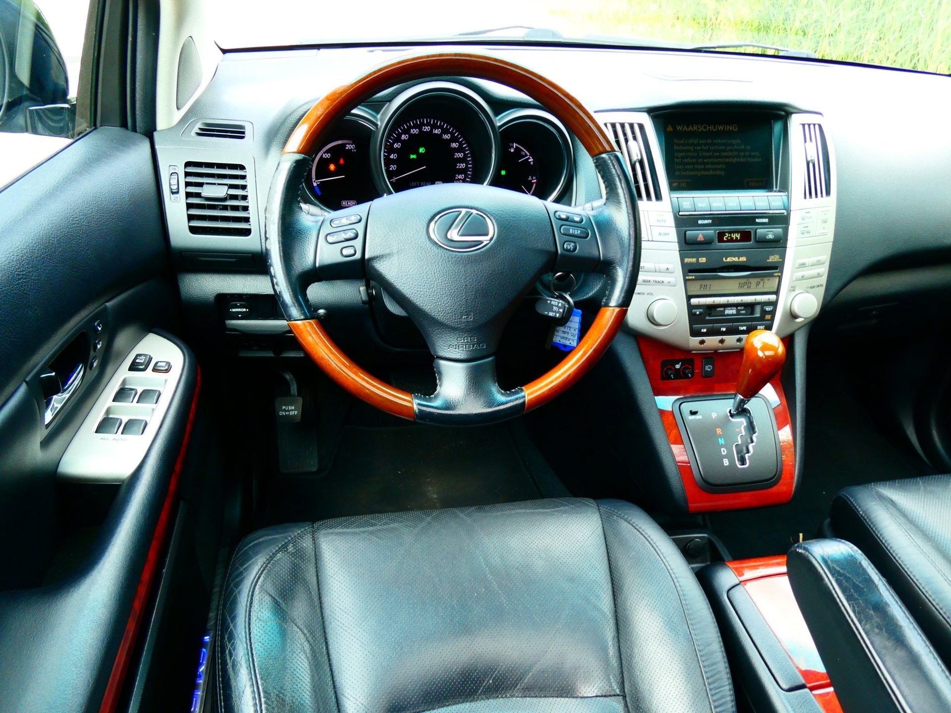 Lexus RX 400h 211pk Automaat Clima Leder Navi Schuifdak Xeno, Auto's, Lexus, Automaat, 3311 cc, Gebruikt, Zwart