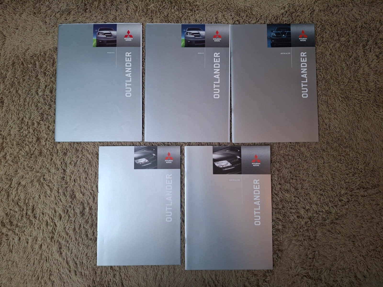 Lot autofolders Mitsubishi Outlander 1e generatie, Verzenden, Zo goed als nieuw, Mitsubishi