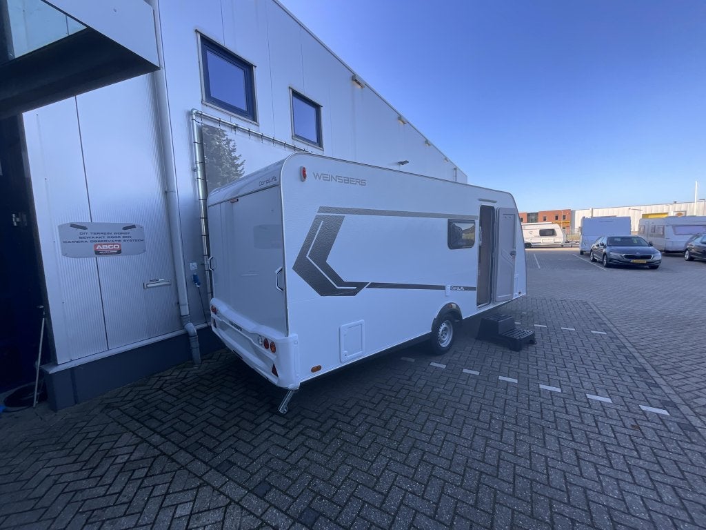 Weinsberg CaraLife 500 QDK STAPELBED-AIRCO, Caravans en Kamperen, Overige merken, Bedrijf, Treinzit, Schokbreker