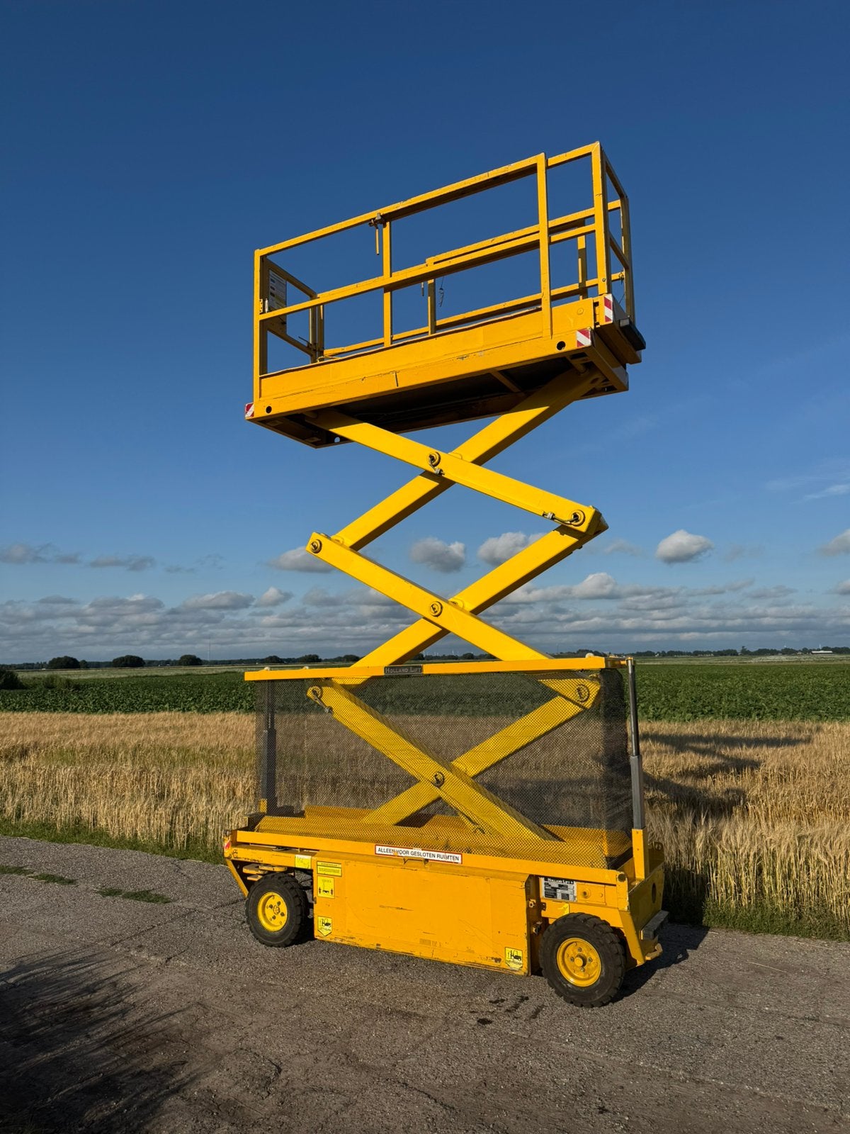 Holland lift schaarhoogwerker hollandlift Y64EL8 Monostar, Zakelijke goederen, Machines en Bouw | Liften, Steigers en Ladders