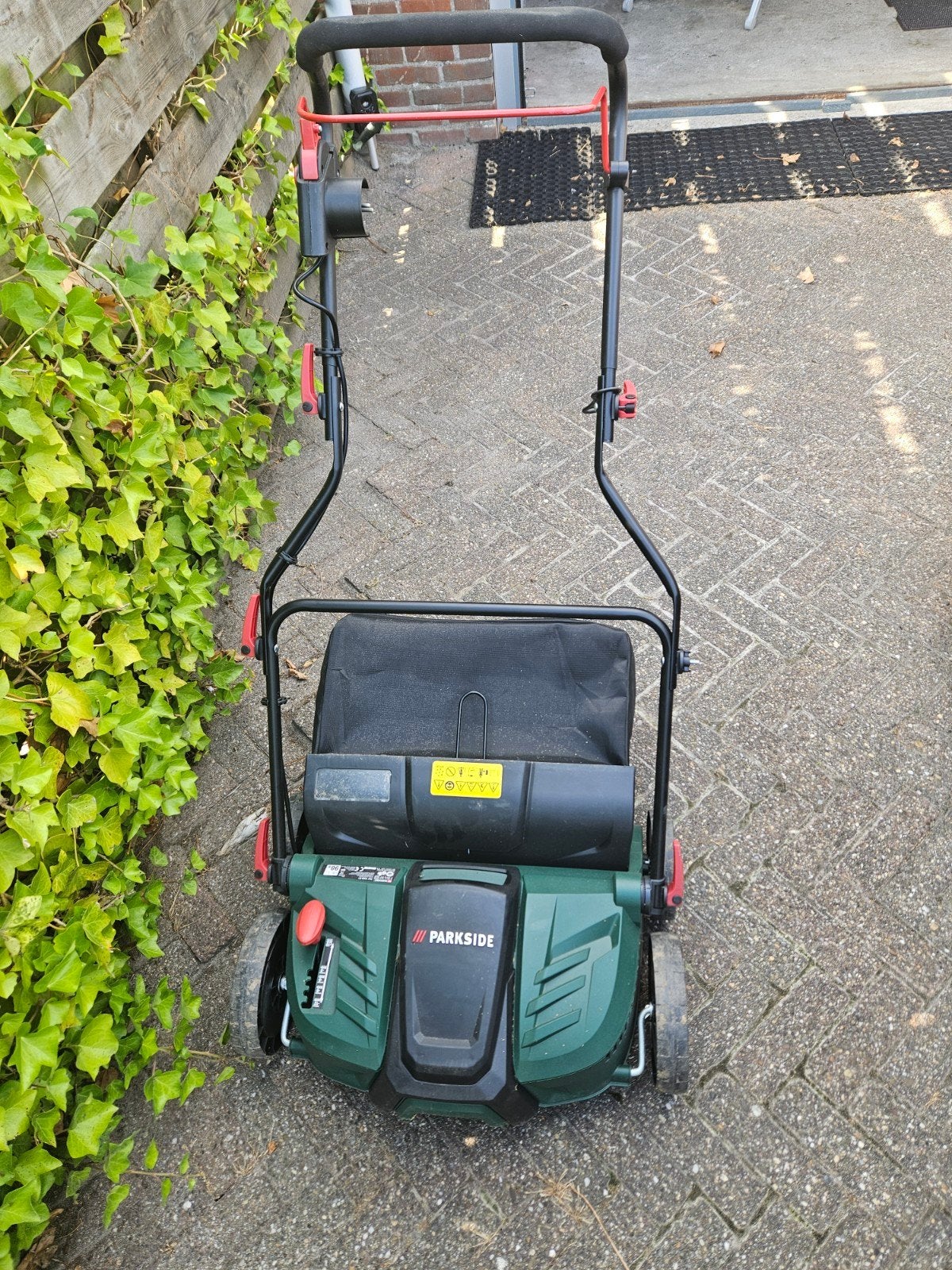 Parkside Verticuteermachine/Gazonbeluchter, Ophalen
