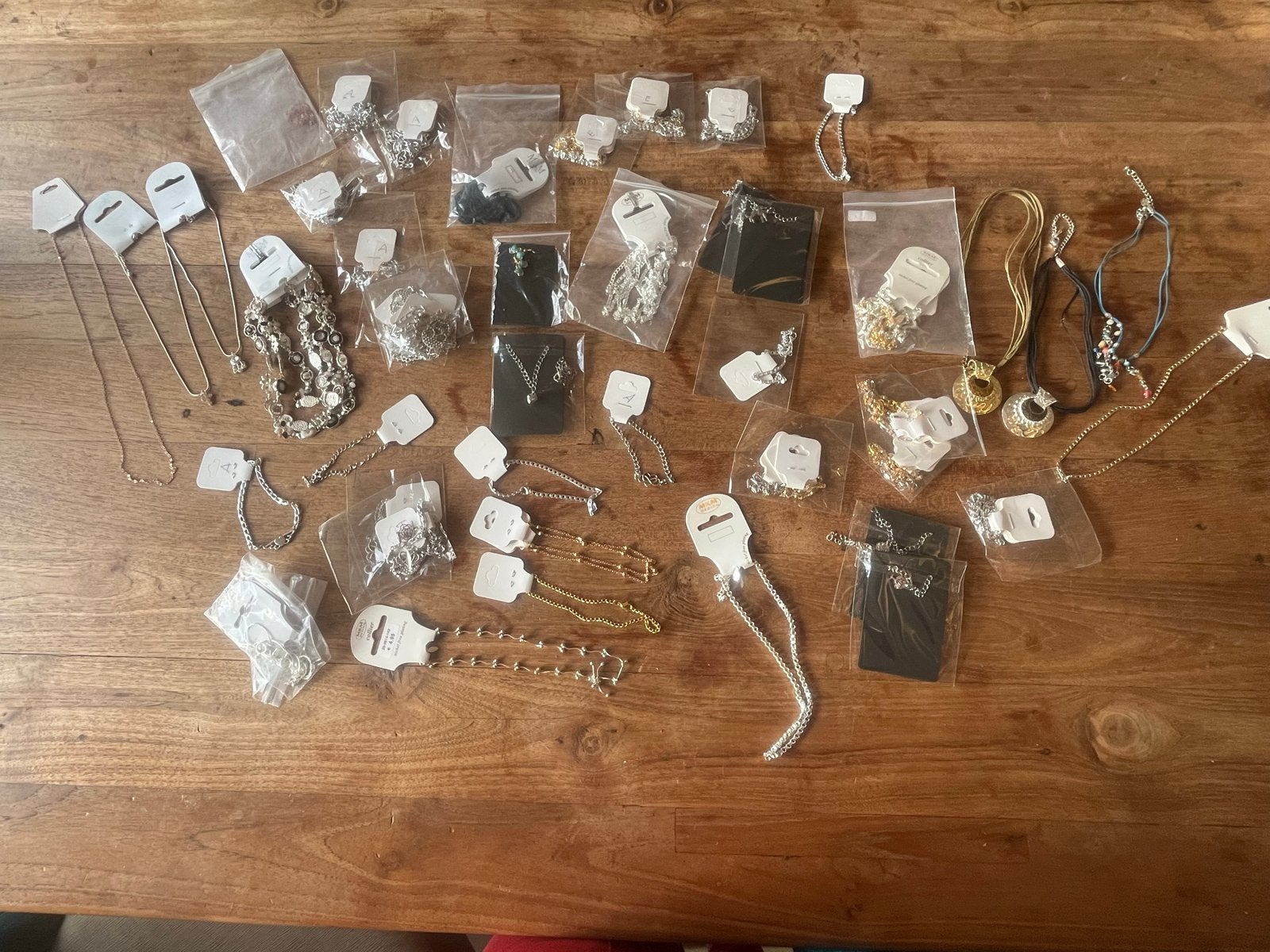 Grote partij nieuwe kettingen armbanden enkelbandjes, Nieuw, Ophalen of Verzenden, Goud, Overige materialen