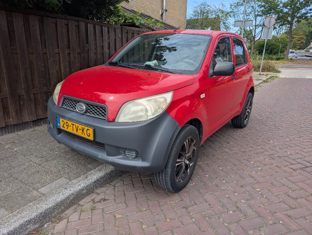 Daihatsu Terios 1.5 2WD 2007 Rood, Auto's, Daihatsu, 13 km/l, 1350 kg, Zwart, 400 kg