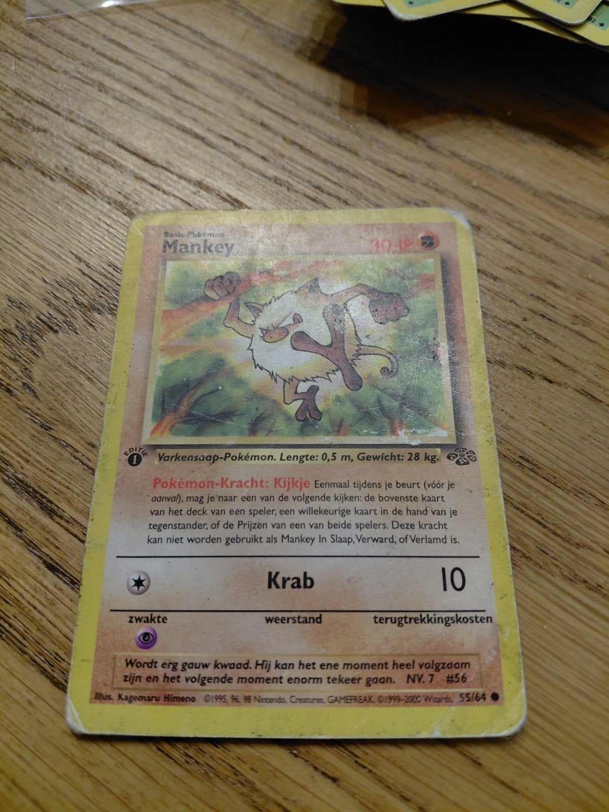 Mankey 1st edition - kaart 55/64 (Base set NL), Hobby en Vrije tijd, Verzamelkaartspellen | Pokémon, Ophalen of Verzenden, Gebruikt